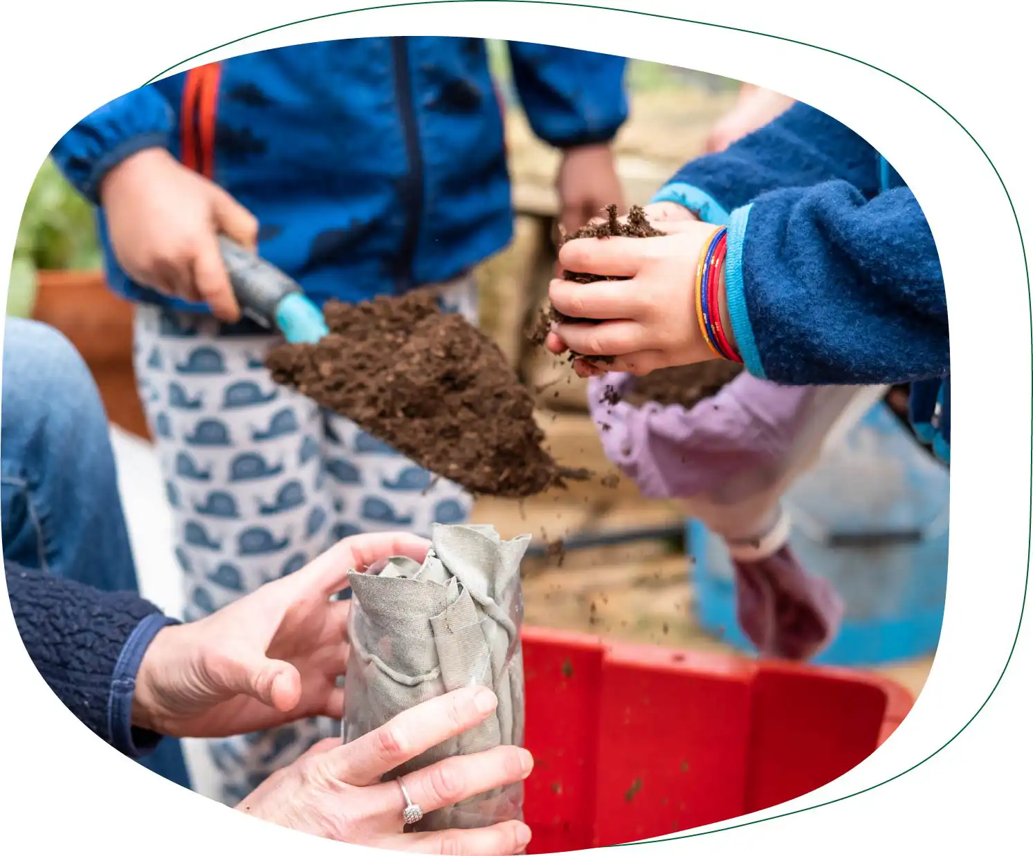 Close up of hands dealing with soil